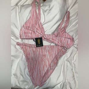 Never worn Skatie swim suit